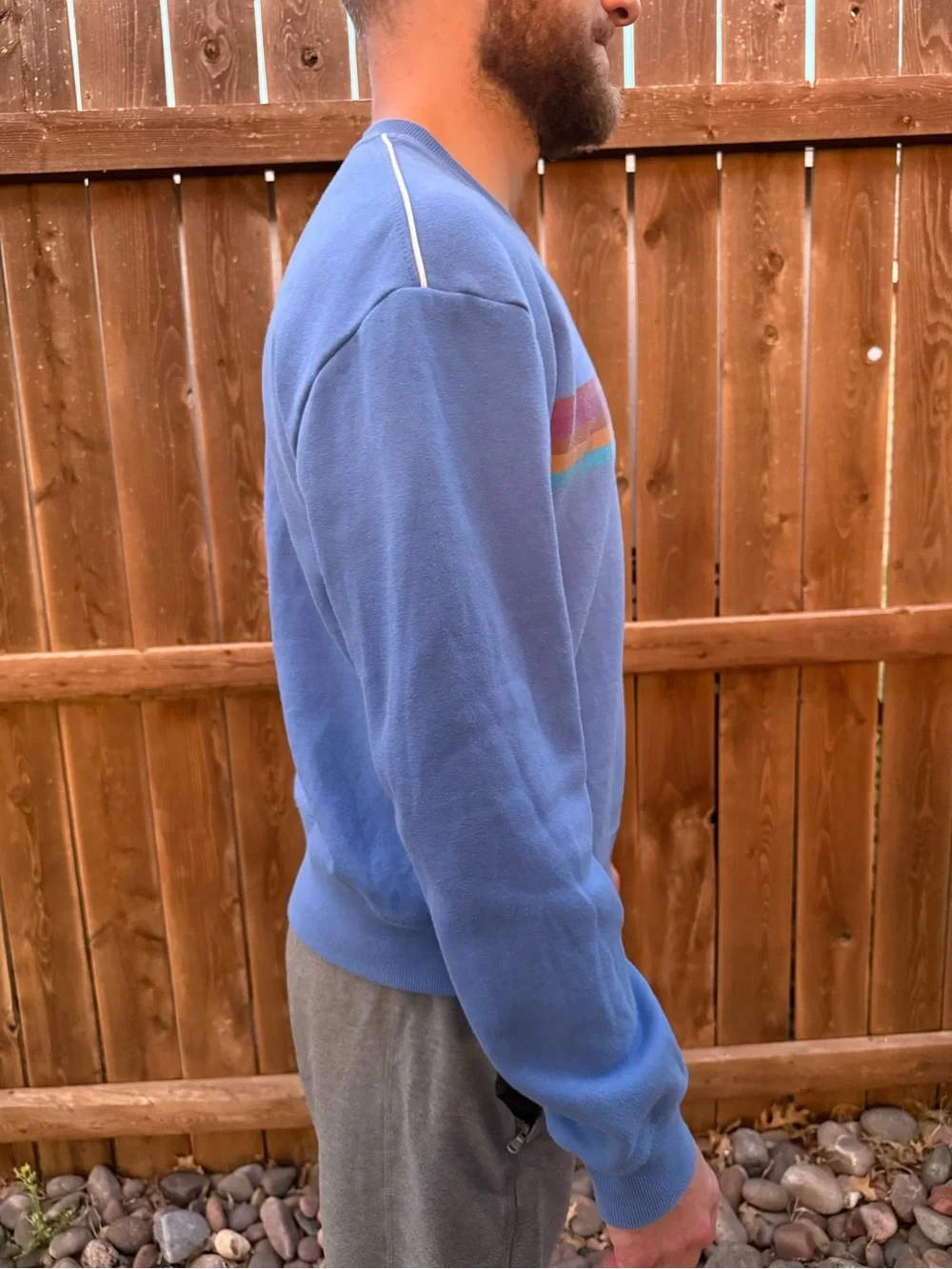 cotopaxi blue crewneck sweater with multicolor stripe logo